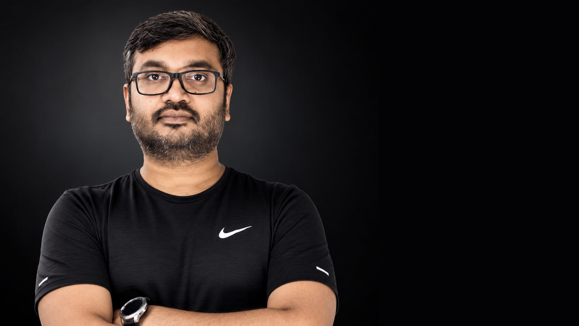 Swapnil Shiwalay, arms folded, studio portrait